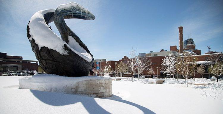 One World One Water sculpture on a snowy day.